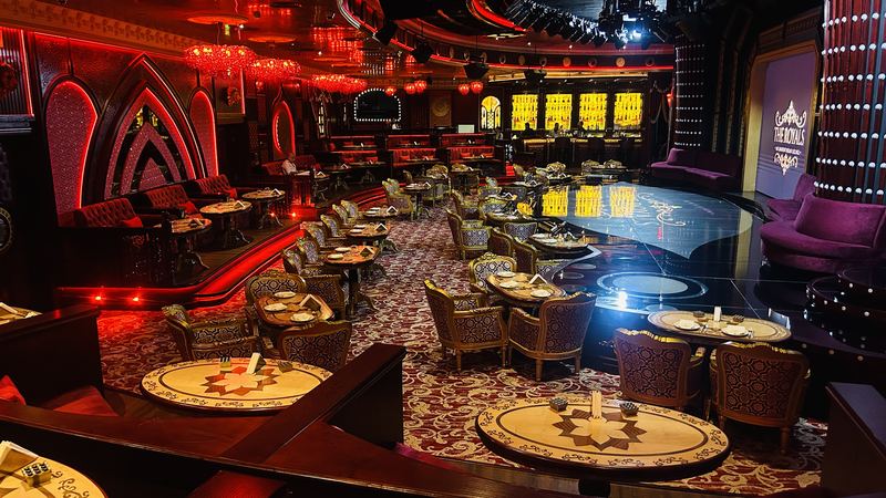 The lit bar seen across the dance floor